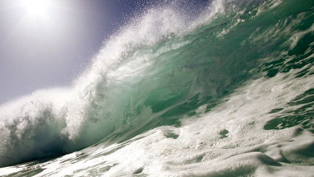 Surfing wave ocean sunshine impressionist free wallpaper for desktop - medium preview image
