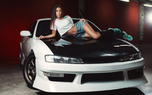 Woman car garage denim shorts free wallpaper for desktop - medium preview image