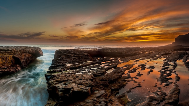 Sunset rocky beach water cliff #5 free wallpaper for desktop - medium preview image