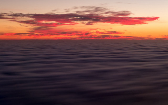 Sunset water clouds plane volumetric free wallpaper for desktop - medium preview image