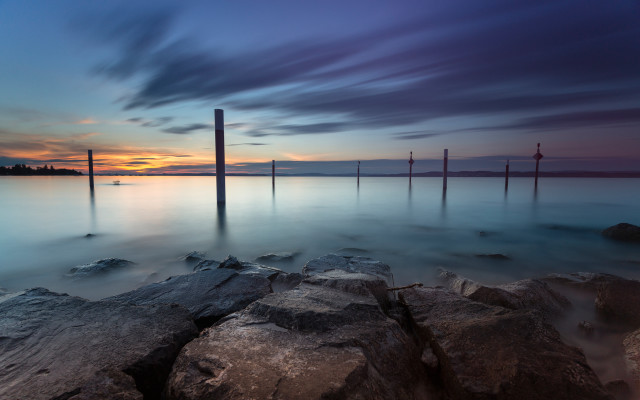 Sunset water mountains rocks boat free wallpaper for desktop - medium preview image