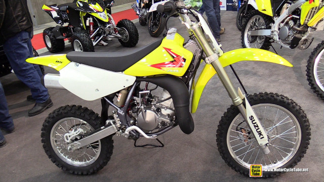 Yellow dirt bike cement floor free wallpaper for desktop - medium preview image