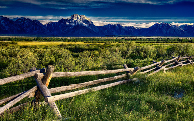 Wooden fence grassy mountains clouds free wallpaper for desktop - medium preview image