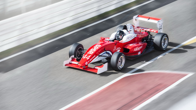 Red race car driver heidelberg free wallpaper for desktop - medium preview image