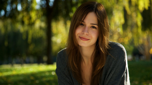 Woman park smiling bokeh naturalism free wallpaper for desktop - medium preview image