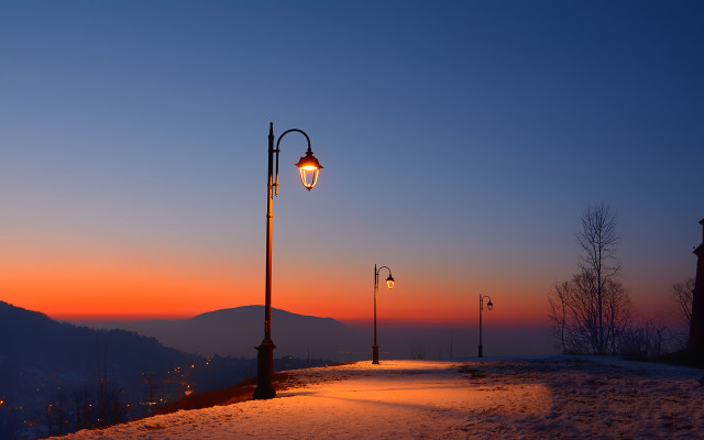 Snowy road mountain sunset lamp free wallpaper for desktop - medium preview image