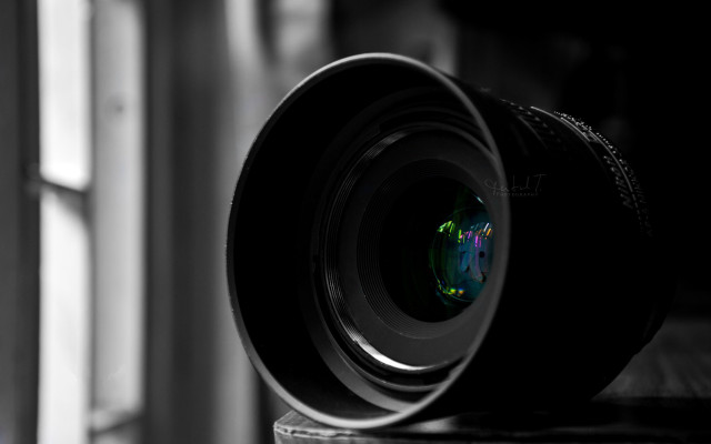 Camera lens wooden table reflection free wallpaper for desktop - medium preview image