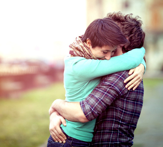Couple hugging field grass building free wallpaper for tablet - medium preview image