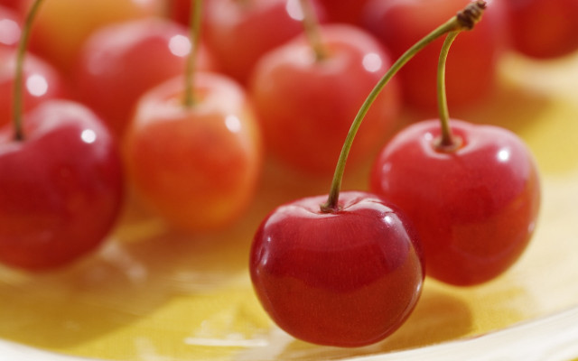Cherries yellow cloth plate blurry free wallpaper for desktop - medium preview image