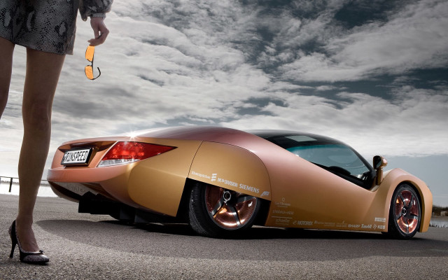 Woman goldcar highheels cloudyroad panpfuturism free wallpaper for desktop - medium preview image