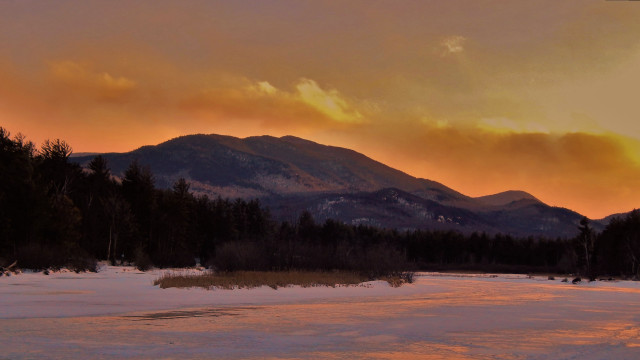 Sunset mountain range snowy field free wallpaper for desktop - medium preview image