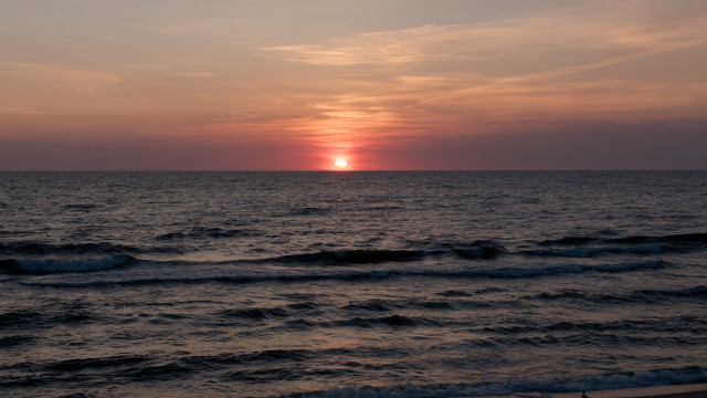 Sunset ocean waves beach person #3 free wallpaper for desktop - medium preview image