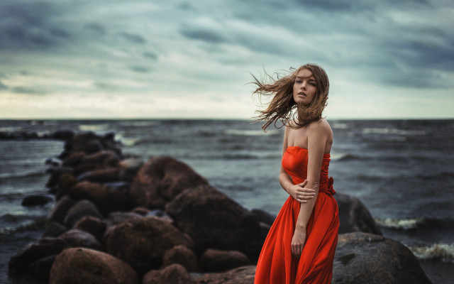 Woman red dress ocean rocks free wallpaper for desktop - medium preview image