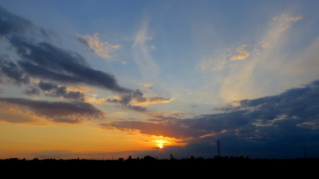 Sunset clouds cityscape horizon ocean free wallpaper for desktop - medium preview image
