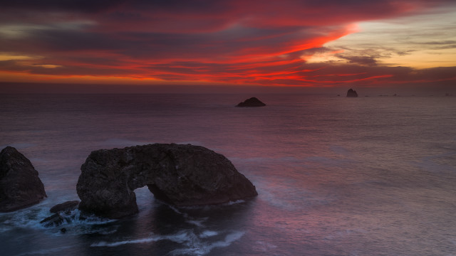 Sunset ocean rocks mystical colors free wallpaper for desktop - medium preview image