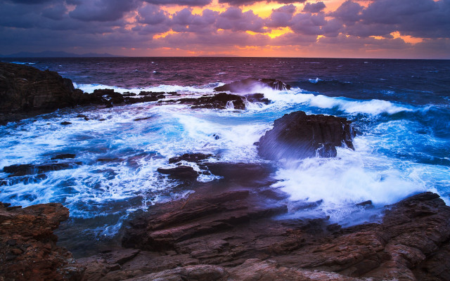 Ocean waves rocks sunset cloudy free wallpaper for desktop - medium preview image