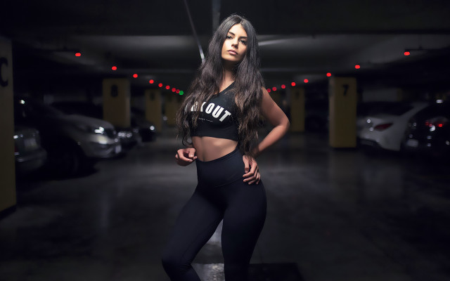 Woman black top leggings parking free wallpaper for desktop - medium preview image