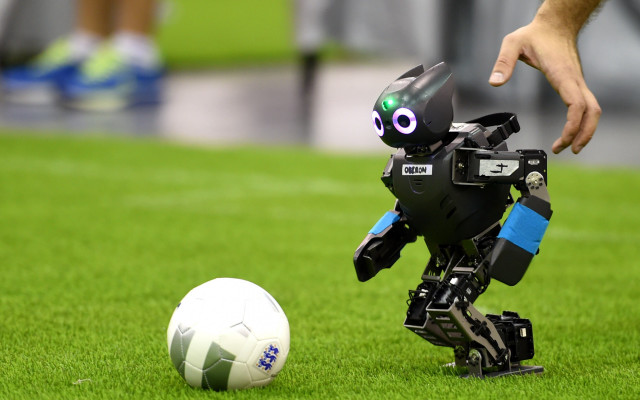 Robot soccer field blurry depth free wallpaper for desktop - medium preview image