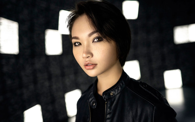 Woman black jacket black background free wallpaper for desktop - medium preview image