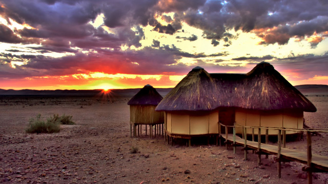 Sunset desert huts bridge cloudy free wallpaper for desktop - medium preview image