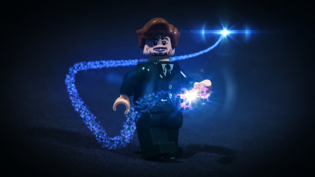 Lego man holding lights glowing free wallpaper for desktop - medium preview image