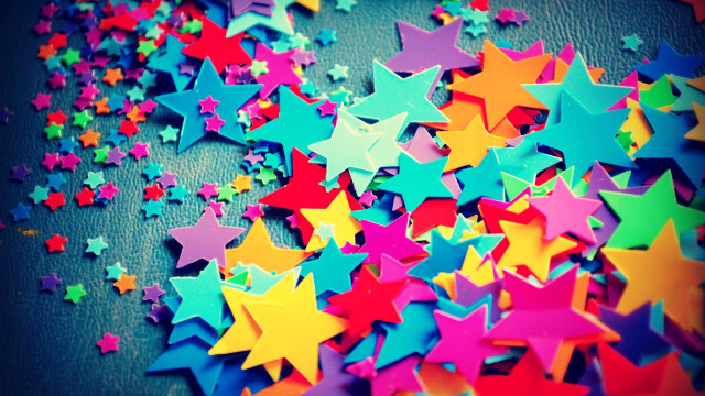 Colorful stars tabletop black background #3 free wallpaper for desktop - medium preview image