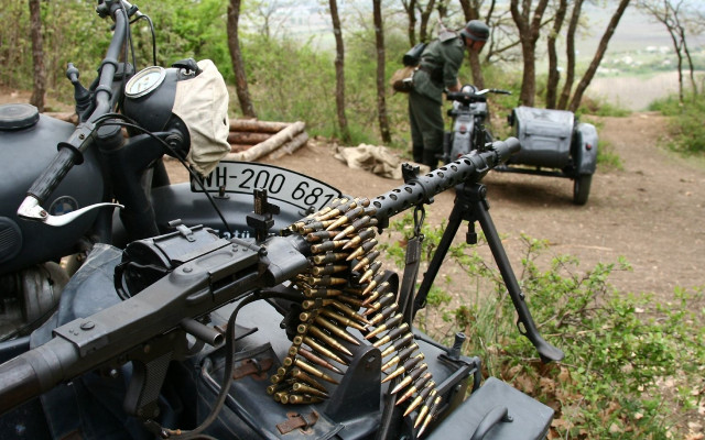 Couple men motorcycle guns outdoors free wallpaper for desktop - medium preview image