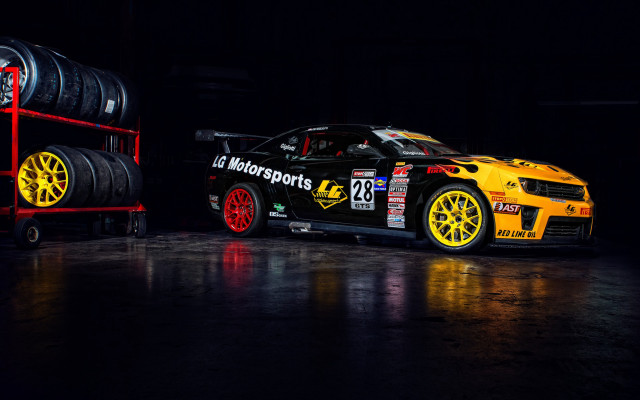 Yellow car tires dark room free wallpaper for desktop - medium preview image