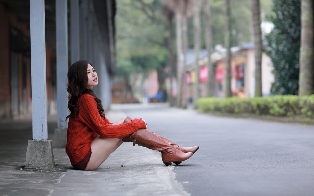 Woman sitting urban bokeh cosplay free wallpaper for desktop - medium preview image