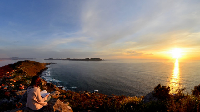 Woman ocean sunset rock beach free wallpaper for desktop - medium preview image