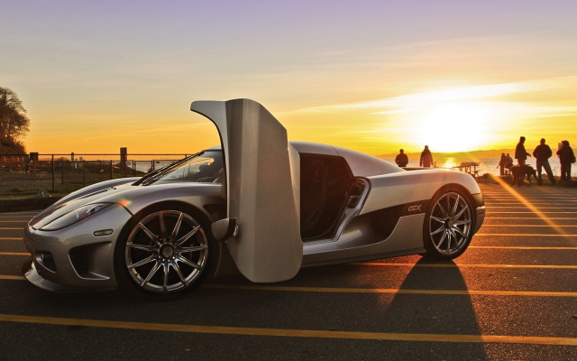Silver sports car sunset parking free wallpaper for desktop - medium preview image