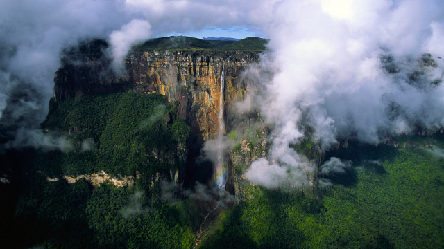 Mountain cliff clouds waterfall forest free wallpaper for desktop - medium preview image