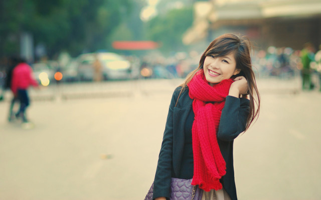 Woman red scarf smiles plaza free wallpaper for desktop - medium preview image