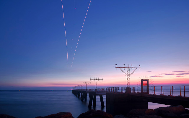 Pier plane sunset contrails water #5 free wallpaper for desktop - medium preview image