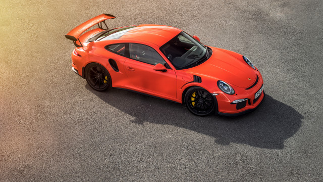 Bright orange sports car hood free wallpaper for desktop - medium preview image