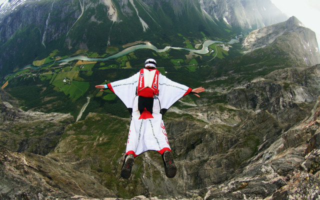 Flying person white red mountain free wallpaper for desktop - medium preview image