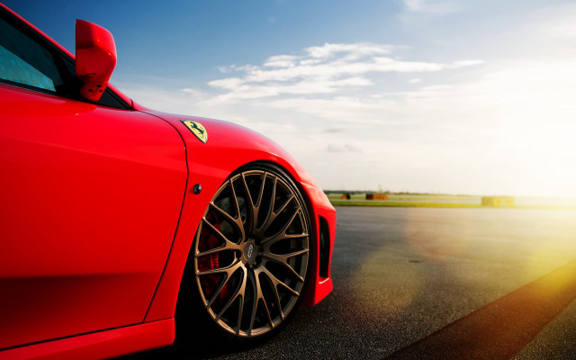 Red sports car sunshine blue free wallpaper for desktop - medium preview image