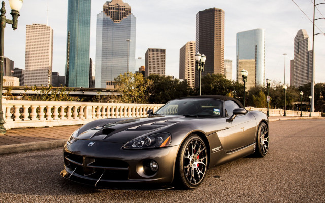 Sports car city skyline matte free wallpaper for desktop - medium preview image