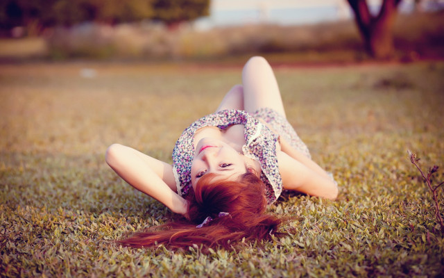 Woman grass blowing hair portrait free wallpaper for desktop - medium preview image