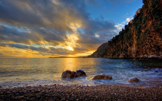 Sunset rocky beach cliff water free wallpaper for desktop - medium preview image