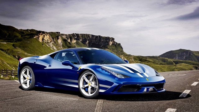Blue sports car driving mountain free wallpaper for desktop - medium preview image