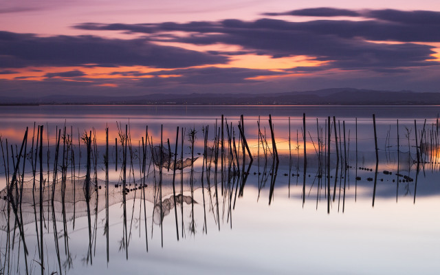 Lake sticks sunset purple sky free wallpaper for desktop - medium preview image