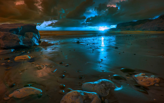 Beach rocks water cloudy sky free wallpaper for desktop - medium preview image