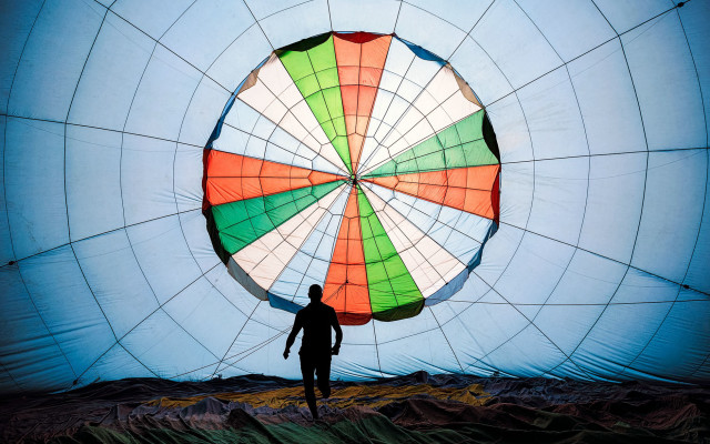 Man parachute fence rooftop tiles free wallpaper for desktop - medium preview image