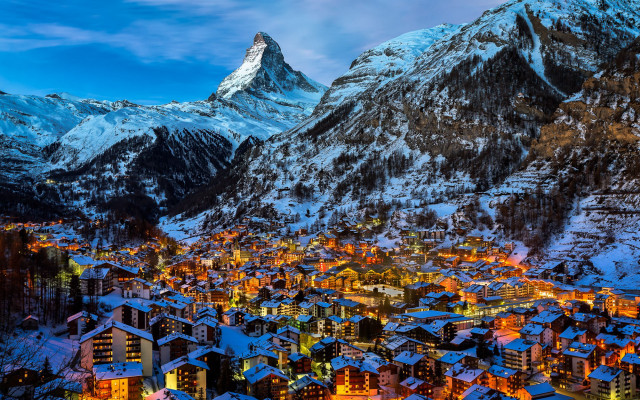 Snowy mountain town night lights free wallpaper for desktop - medium preview image