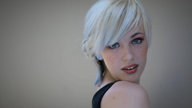 Blonde woman blue eyes black #9 free wallpaper for desktop - medium preview image