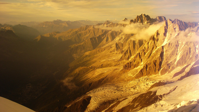 Mountain range plane window clouds free wallpaper for desktop - medium preview image