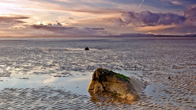 Rock water person distant landscape free wallpaper for desktop - medium preview image