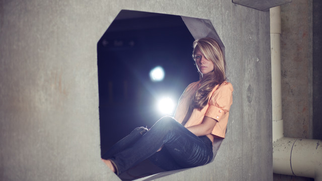 Woman wall cellphone flashlight anamorphic free wallpaper for desktop - medium preview image