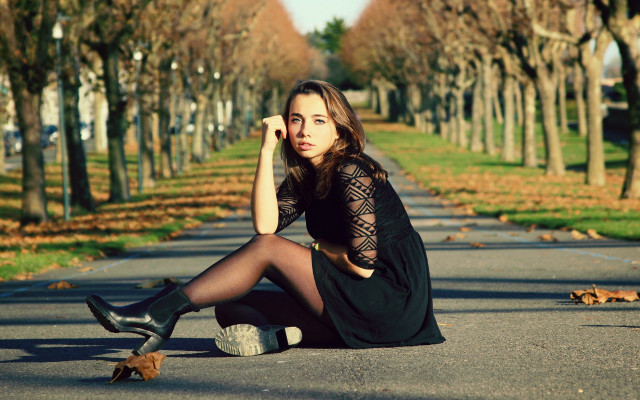 Woman sitting skateboard park city free wallpaper for desktop - medium preview image